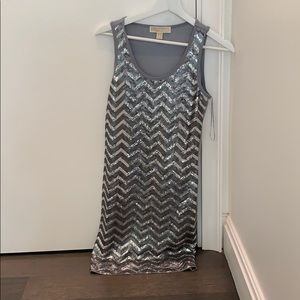 Beautiful short to medium length sequence dress